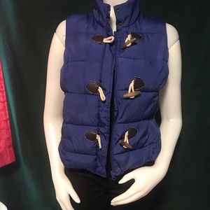 blue puffed vest
